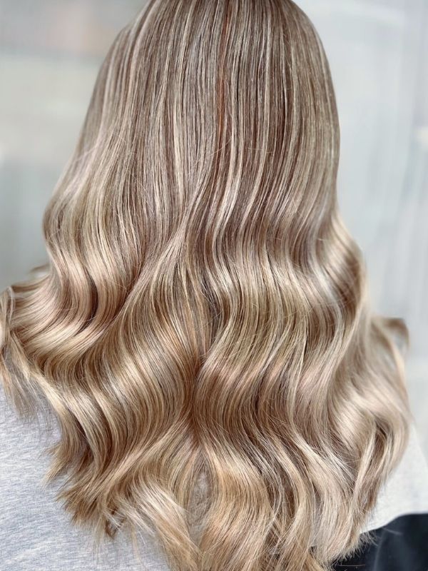 Glossing treatment for long hair – natural, radiant shine and silky finish by Niki Newd® Hair Studio.