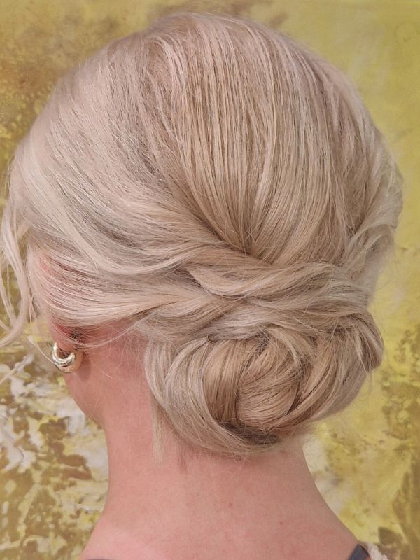 Elegant updo for medium-length hair styled by Hair Studio Niki Newd® — a refined, graceful look ideal for weddings and special occasions.
