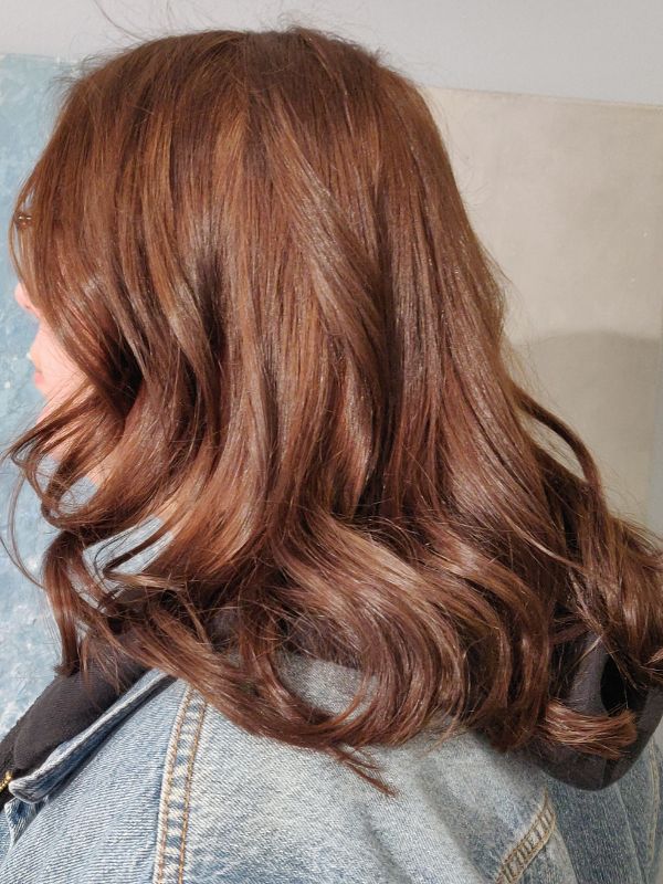 Beautifully coloured hair with a rich, even tone created by Hair Studio Niki Newd® — a fresh, vibrant full-colour result.
