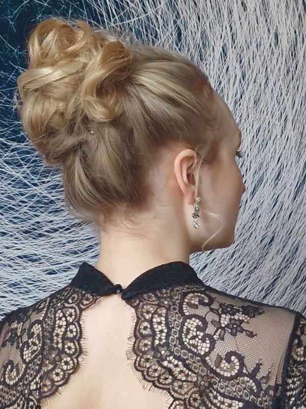 Special gala updo for medium-length hair created by Hair Studio Niki Newd® — sophisticated styling that enhances shine and movement.