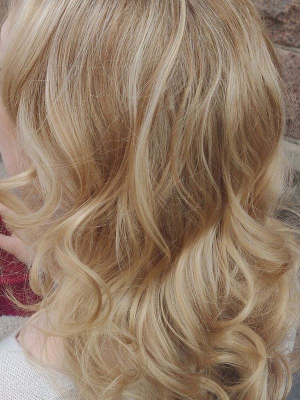 Soft, luminous highlights created by Hair Studio Niki Newd® — adding natural dimension and brightness to the hair.